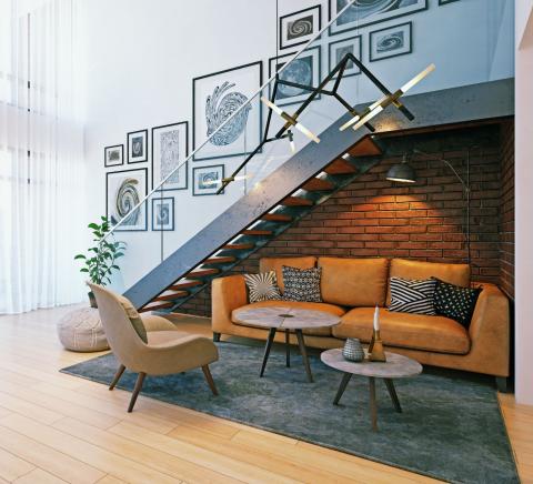 Décoration d'un escalier moderne avec la création d'un espace salon juste en dessous